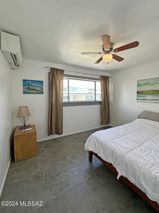 bedroom with an AC wall unit, ceiling fan, and wood-type flooring