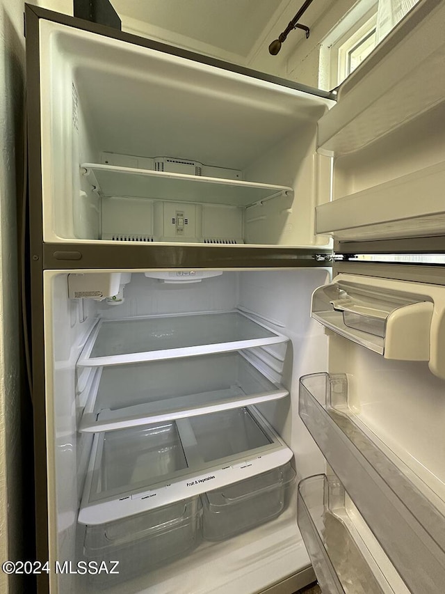 interior details with refrigerator