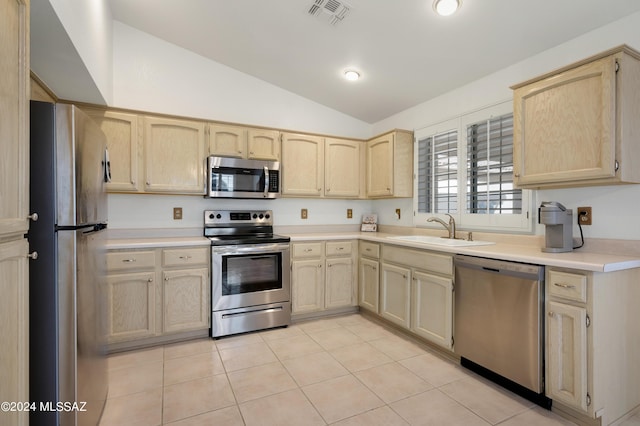 kitchen featuring a sink, visible vents, stainless steel appliances, and light countertops