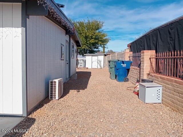 view of property exterior with ac unit