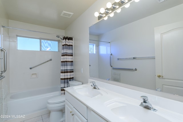 full bathroom featuring toilet, vanity, tile patterned floors, and shower / bathtub combination with curtain