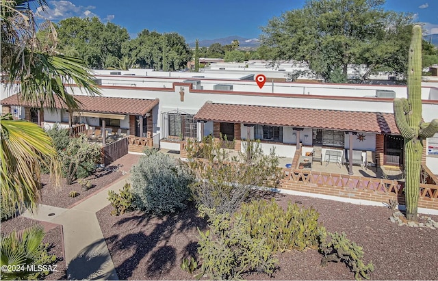 view of front of home featuring a patio