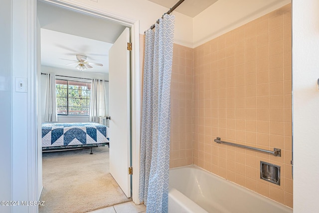 bathroom with shower / bathtub combination with curtain and ceiling fan