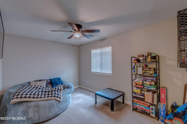 carpeted bedroom featuring ceiling fan