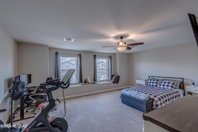 bedroom with ceiling fan and carpet floors