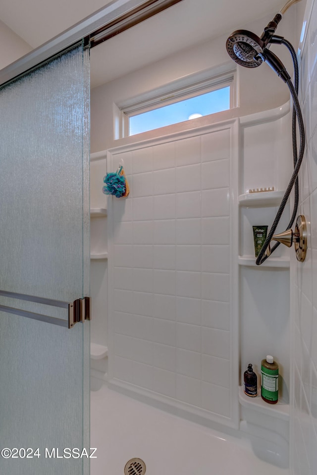 bathroom featuring walk in shower