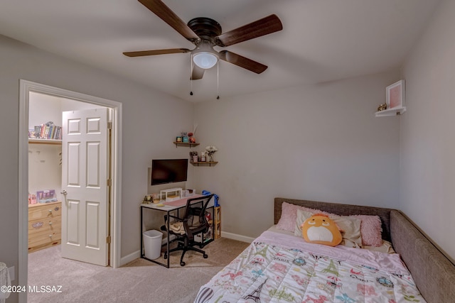 bedroom featuring light carpet and ceiling fan