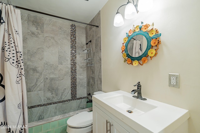 bathroom featuring toilet, vanity, and walk in shower