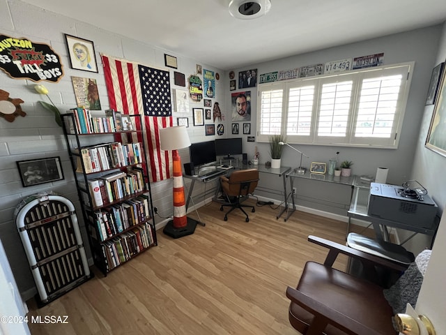 office space with light hardwood / wood-style floors