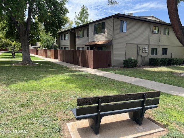 view of home's exterior with a lawn