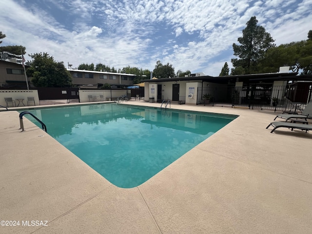 view of pool with a patio area