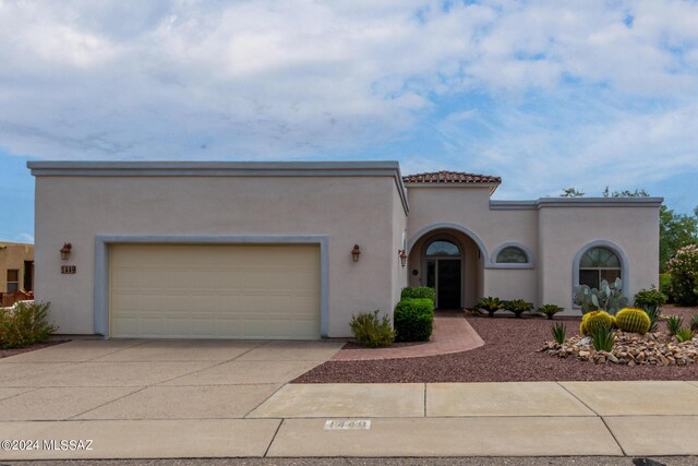 view of front of home with a garage