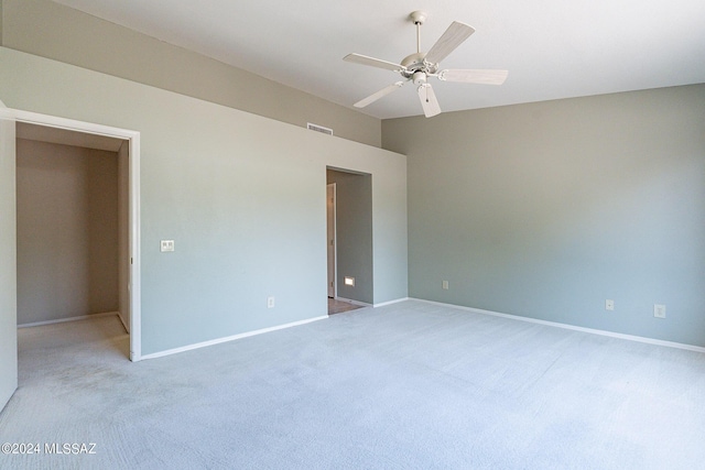 unfurnished bedroom with carpet and ceiling fan