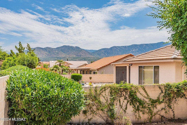 exterior space featuring a mountain view