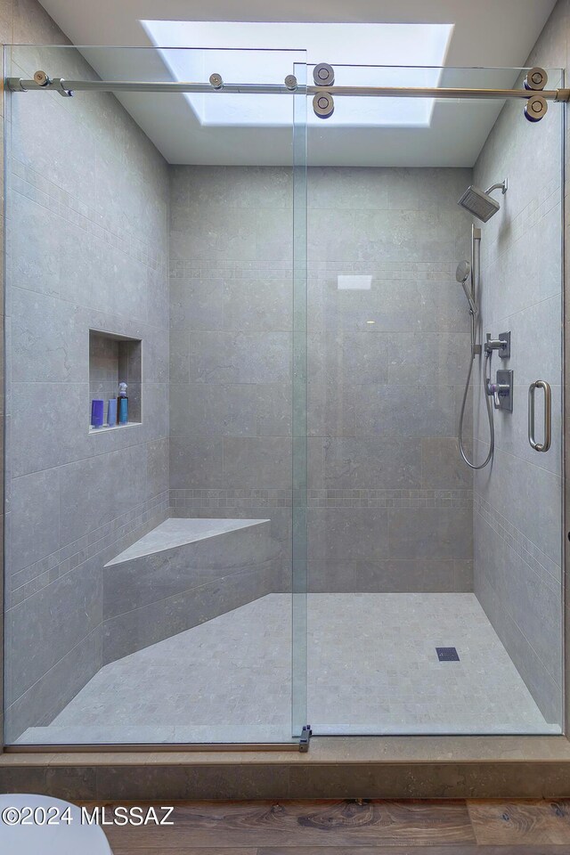 bathroom featuring an enclosed shower