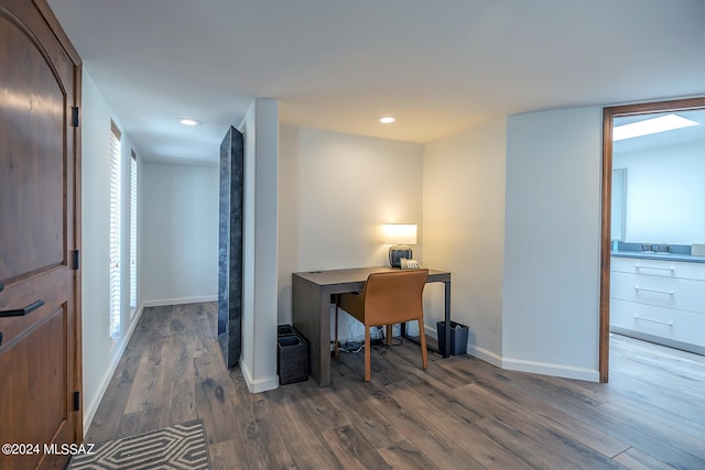 office space with hardwood / wood-style floors