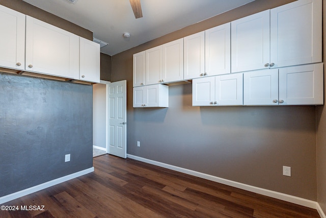 kitchen with white cabinetry, ceiling fan, and dark hardwood / wood-style flooring