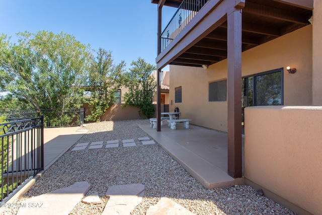 view of patio / terrace with a balcony