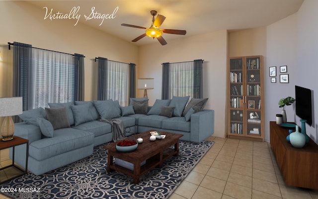 tiled living room with ceiling fan