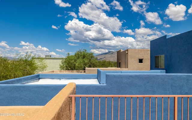 view of swimming pool featuring a mountain view