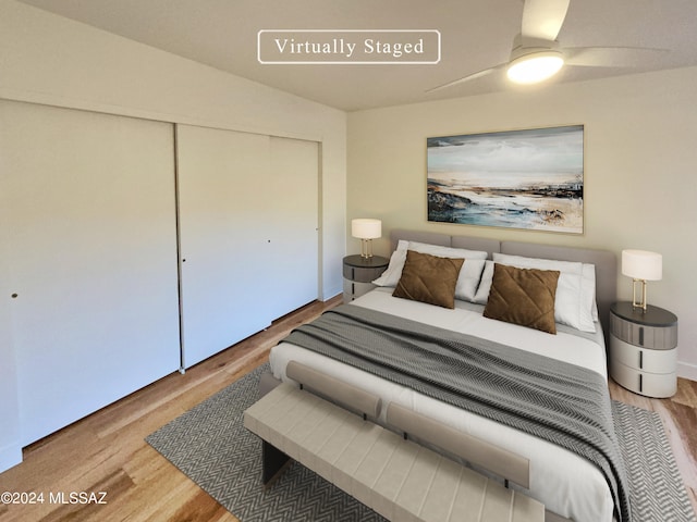 bedroom featuring a closet, ceiling fan, and hardwood / wood-style floors