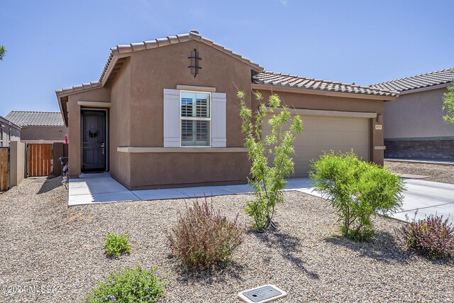 view of front of home with a garage