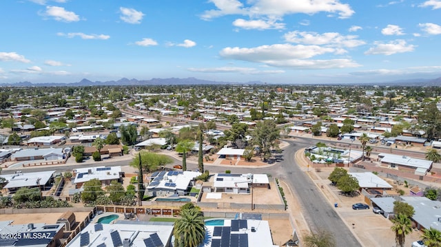 birds eye view of property featuring a mountain view and a residential view