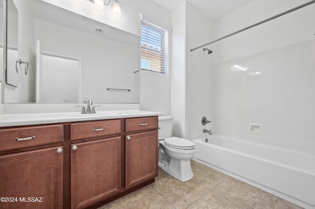 full bathroom with tile patterned floors, vanity,  shower combination, and toilet