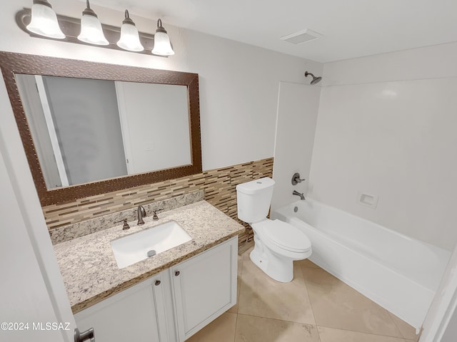 full bathroom with backsplash, vanity, toilet, bathing tub / shower combination, and tile patterned floors