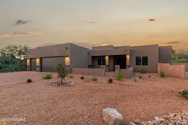 adobe home with a garage