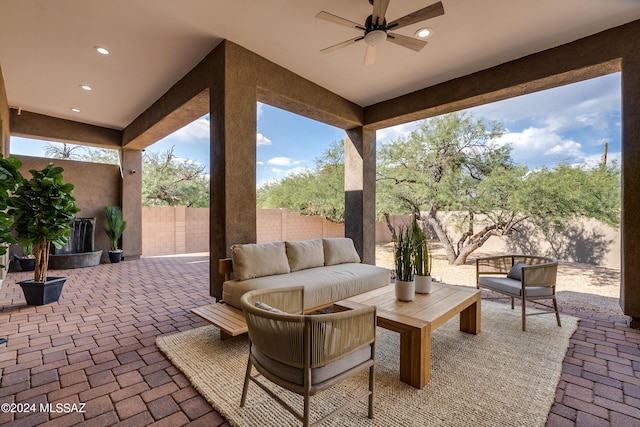 2102 N Corte El Rancho Merlita, Tucson, AZ 85715 - fenced backyard featuring outdoor lounge area, a patio, and a ceiling fan