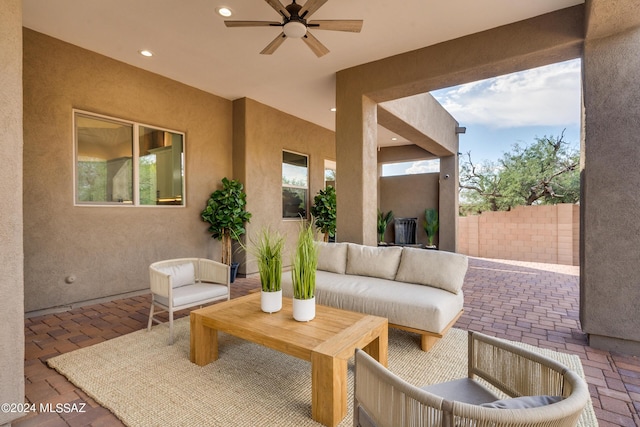 2102 N Corte El Rancho Merlita, Tucson, AZ 85715 - view of patio with an outdoor living space and a ceiling fan