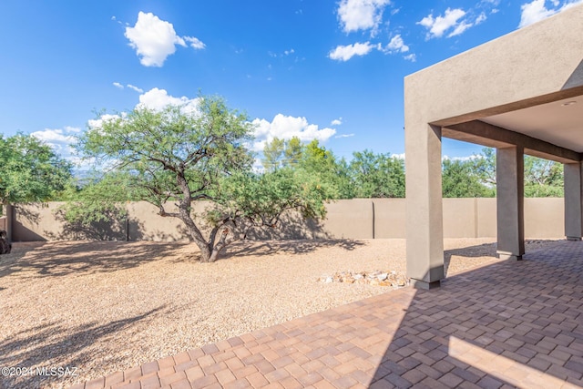 2102 N Corte El Rancho Merlita, Tucson, AZ 85715 - fenced backyard with a patio