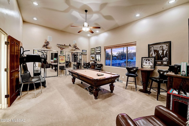 rec room featuring a high ceiling, ceiling fan, light colored carpet, and pool table