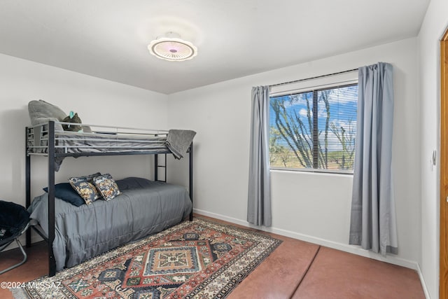 bedroom featuring baseboards