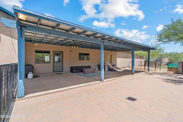 view of patio featuring fence