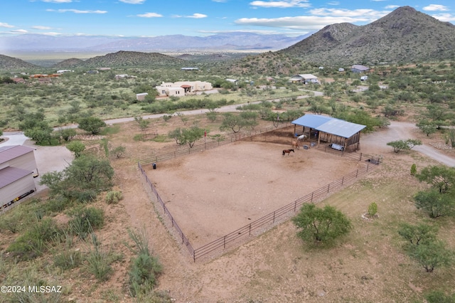 bird's eye view featuring a mountain view and a rural view