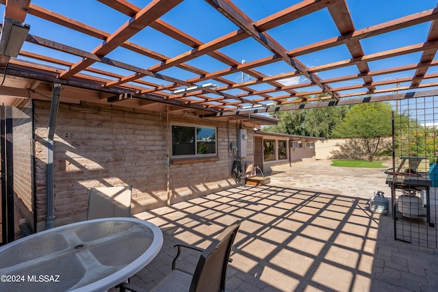 view of patio featuring a pergola