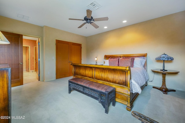 bedroom featuring ceiling fan and a closet