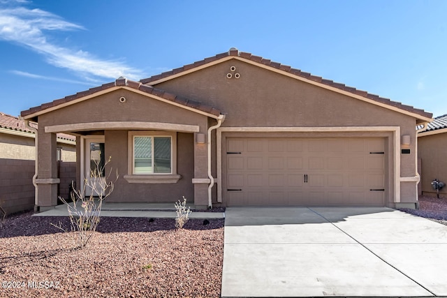 view of front of home with a garage