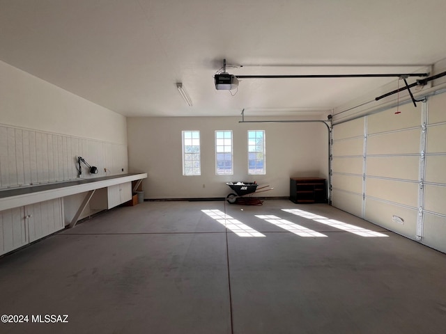 garage featuring a garage door opener