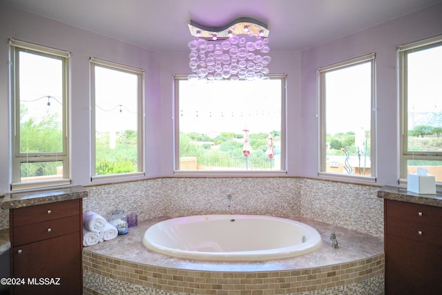 bathroom featuring tiled bath