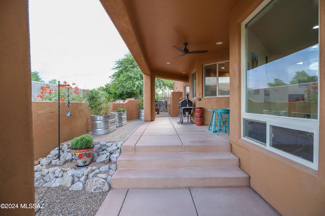 view of patio with ceiling fan