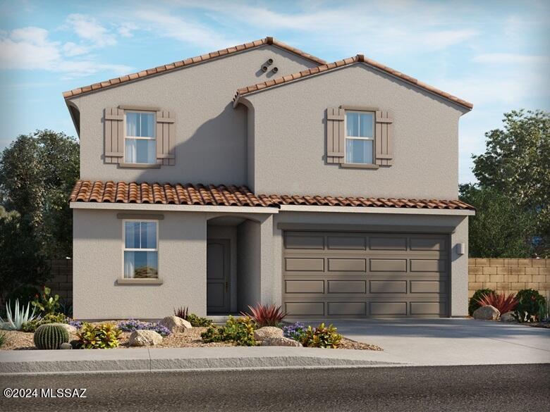 mediterranean / spanish-style home with a garage, driveway, fence, and stucco siding