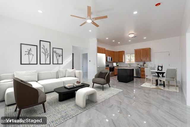 living room featuring ceiling fan