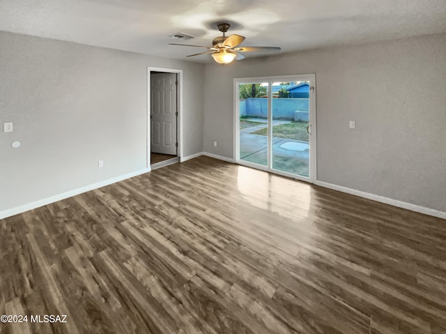 unfurnished room featuring ceiling fan and hardwood / wood-style flooring