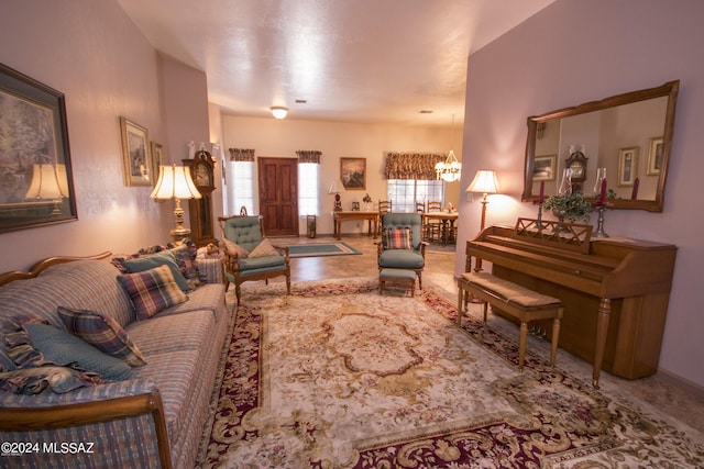 living room with an inviting chandelier