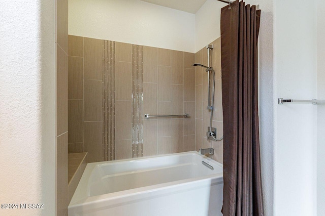 bathroom featuring shower / bath combination with curtain