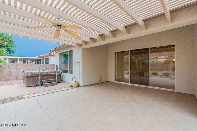 view of patio / terrace featuring ceiling fan and a pergola