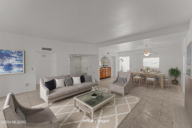 living room featuring light tile patterned flooring